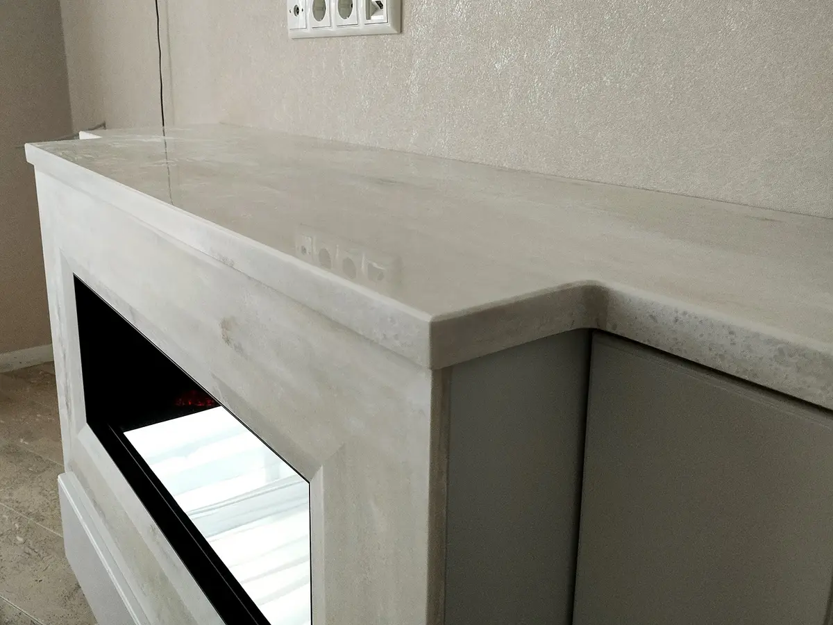 Облицовка камина искусственным камнем Corian 2