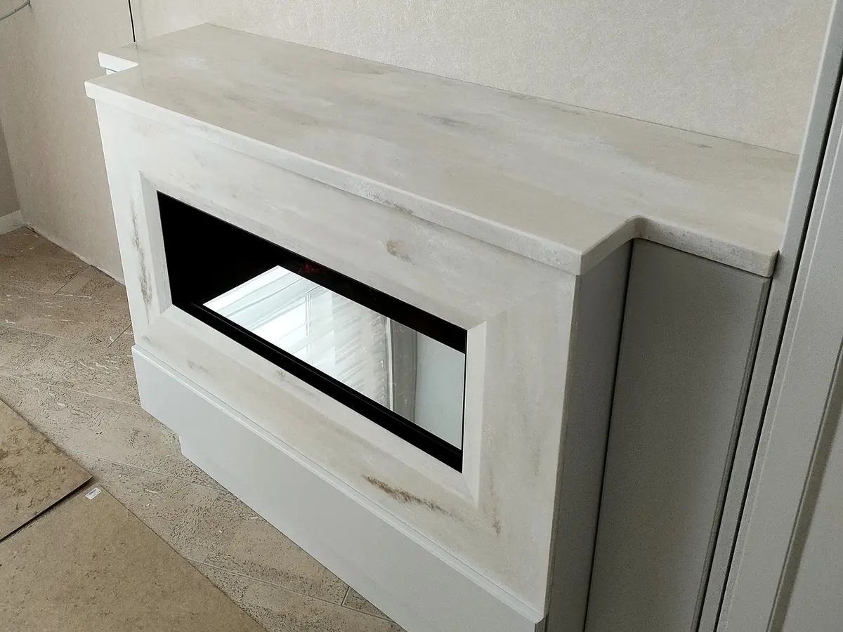 Облицовка камина искусственным камнем Corian 3
